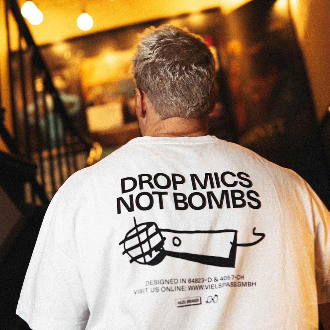 "Drop Mics Not Bombs" T-Shirt (oversized) – Viel Spass Studio