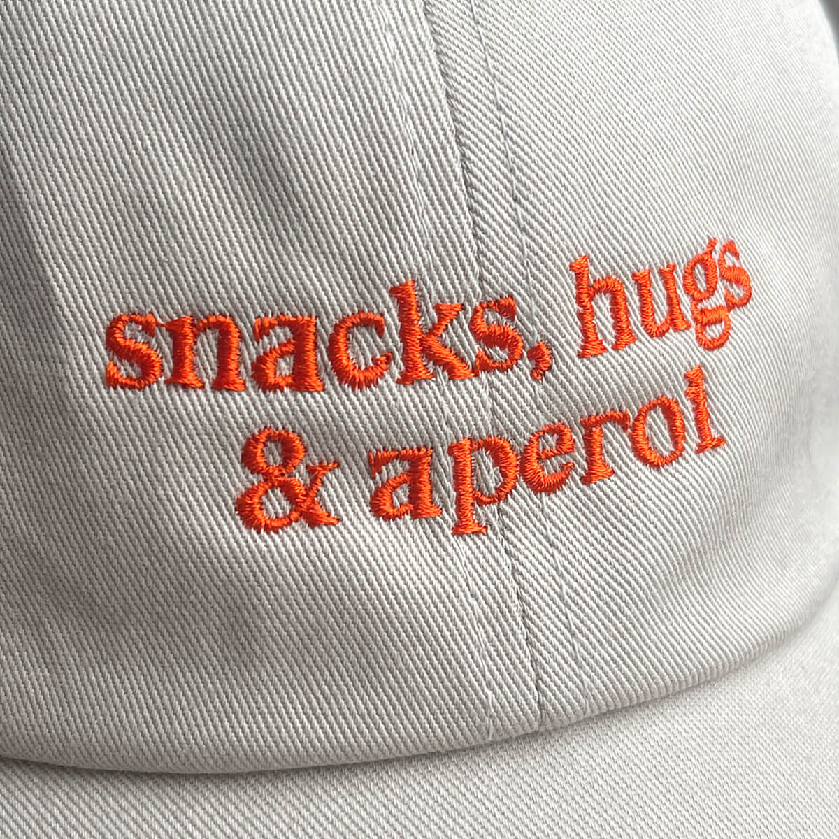 snacks, hugs & aperol Cap – studio ciao